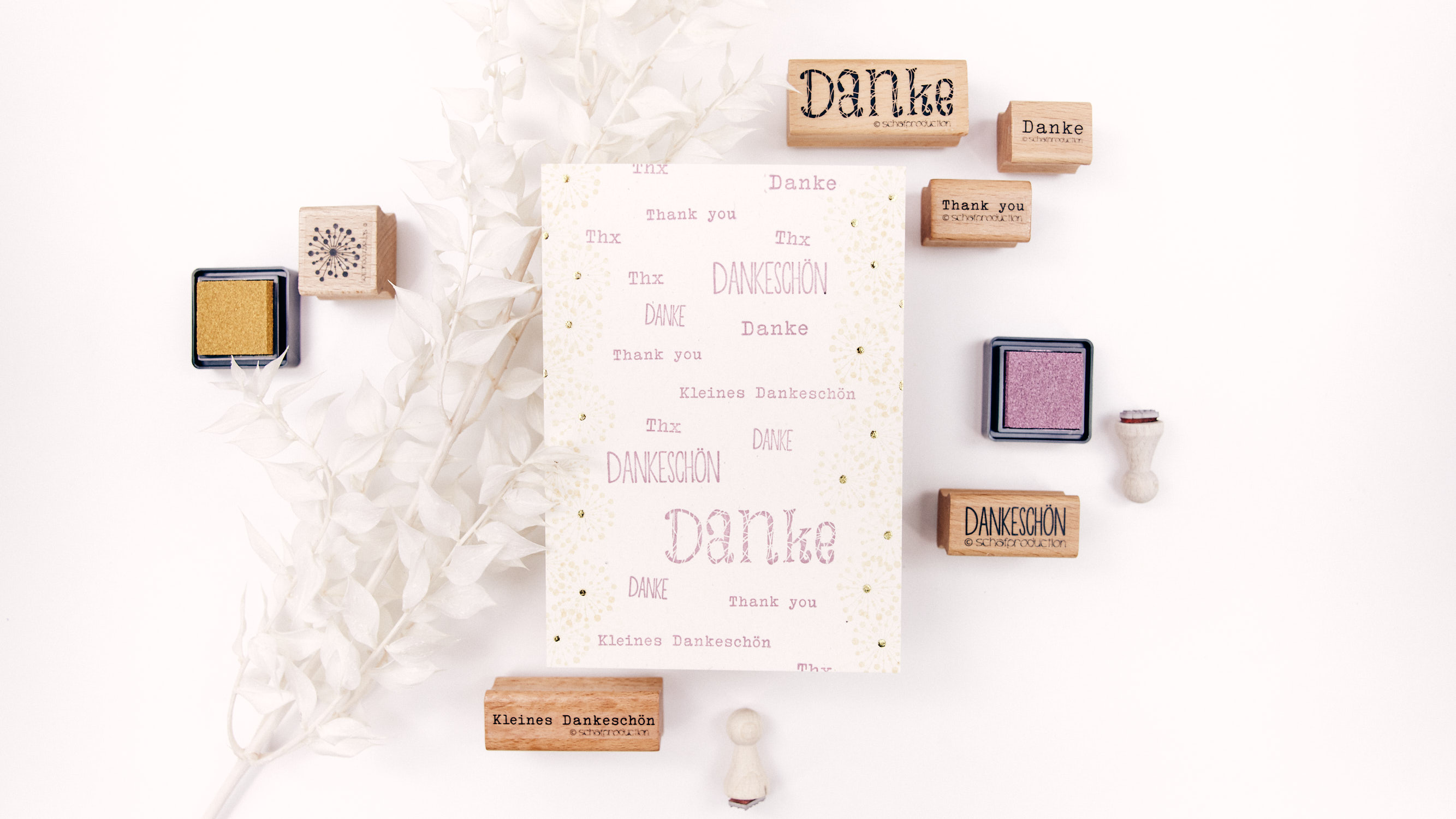 Dankeskarte-mit-vielen-Dankeschoens-und-einem-Rand-aus-geometrischer-Pusteblume-Q